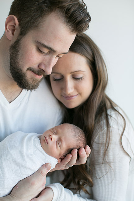 newborn photo with parents